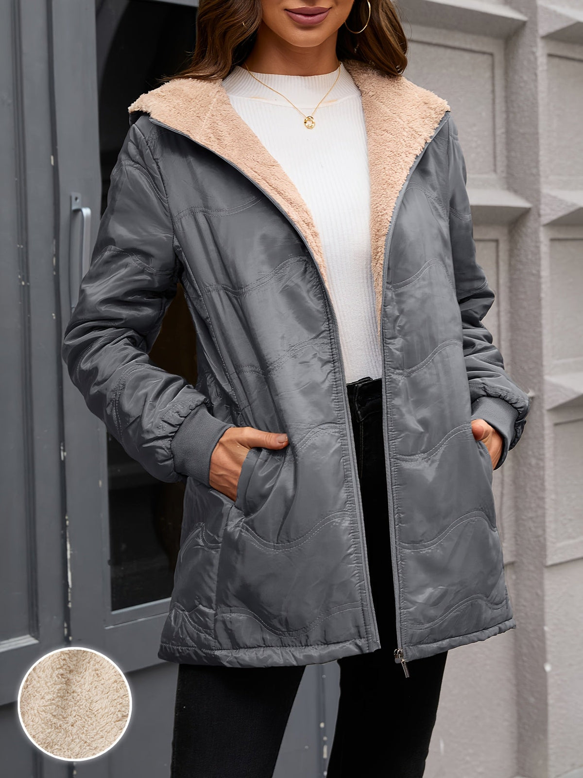 Women's long hooded quilted jacket with fleece-look lining and zip front