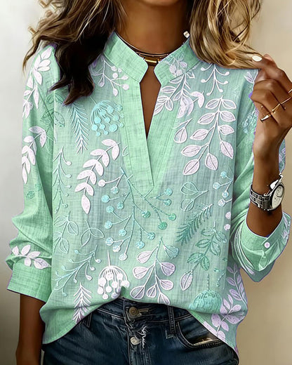 Women's botanical print blouse with notched collar and 3/4 sleeves