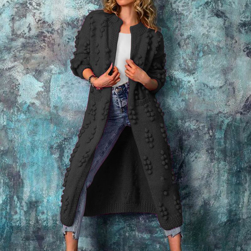 Women's long textured cable knit cardigan with open front and long sleeves