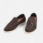 Men's textured slip-on tassel loafers with rounded toes and flat light-coloured soles