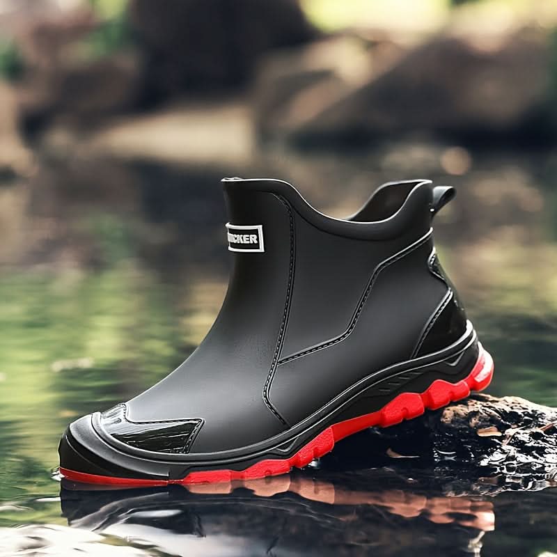 Ankle boots with pull tabs, stitched panels and lug soles