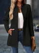 Women's longline stand collar coat with covered buttons