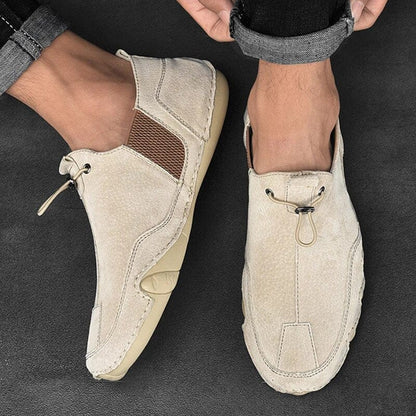 Men's slip-on sneakers with elastic toggle detail and round toe