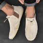 Men's slip-on sneakers with elastic toggle detail and round toe