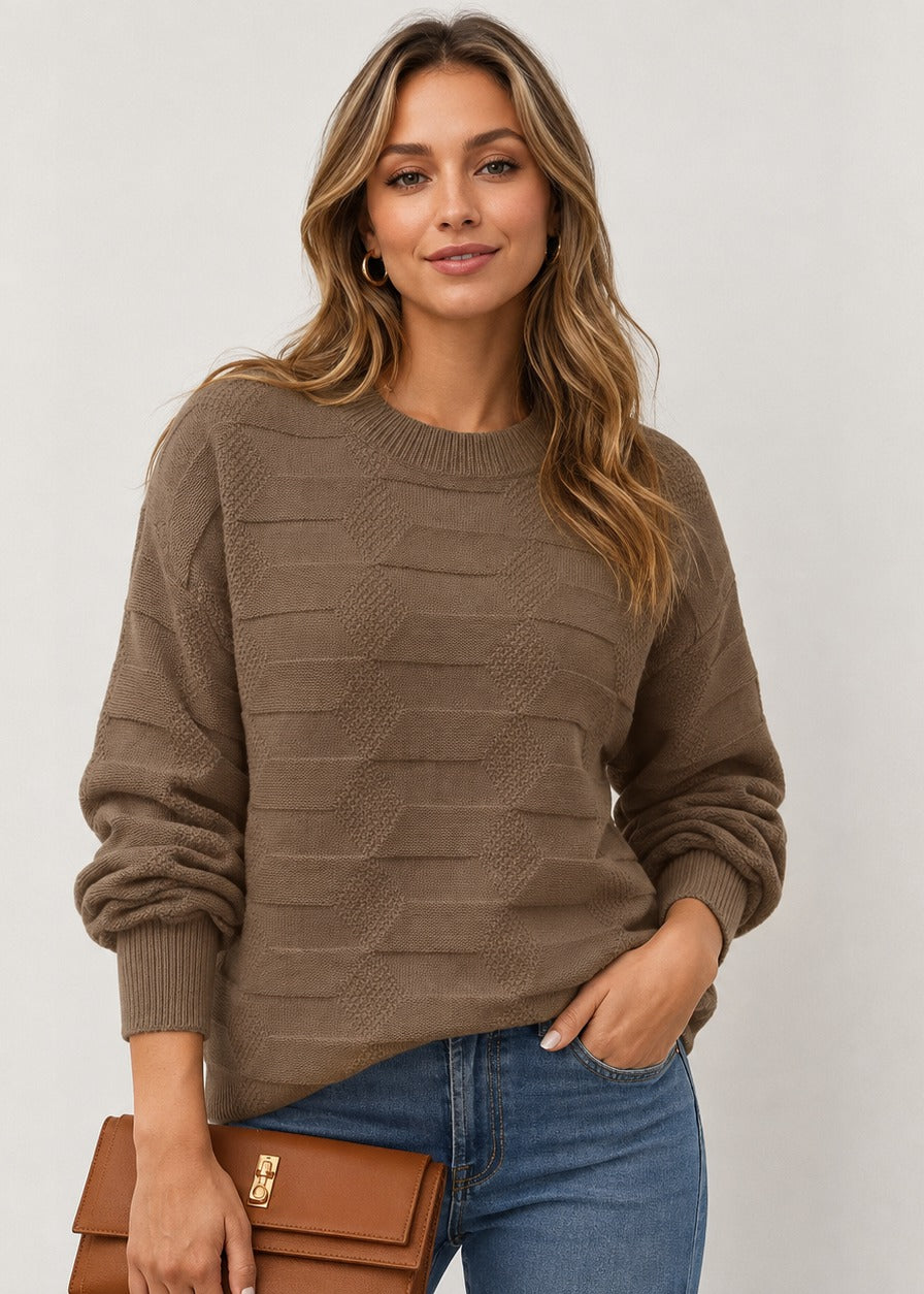 Women's textured crew neck sweater with long sleeves and geometric knit details
