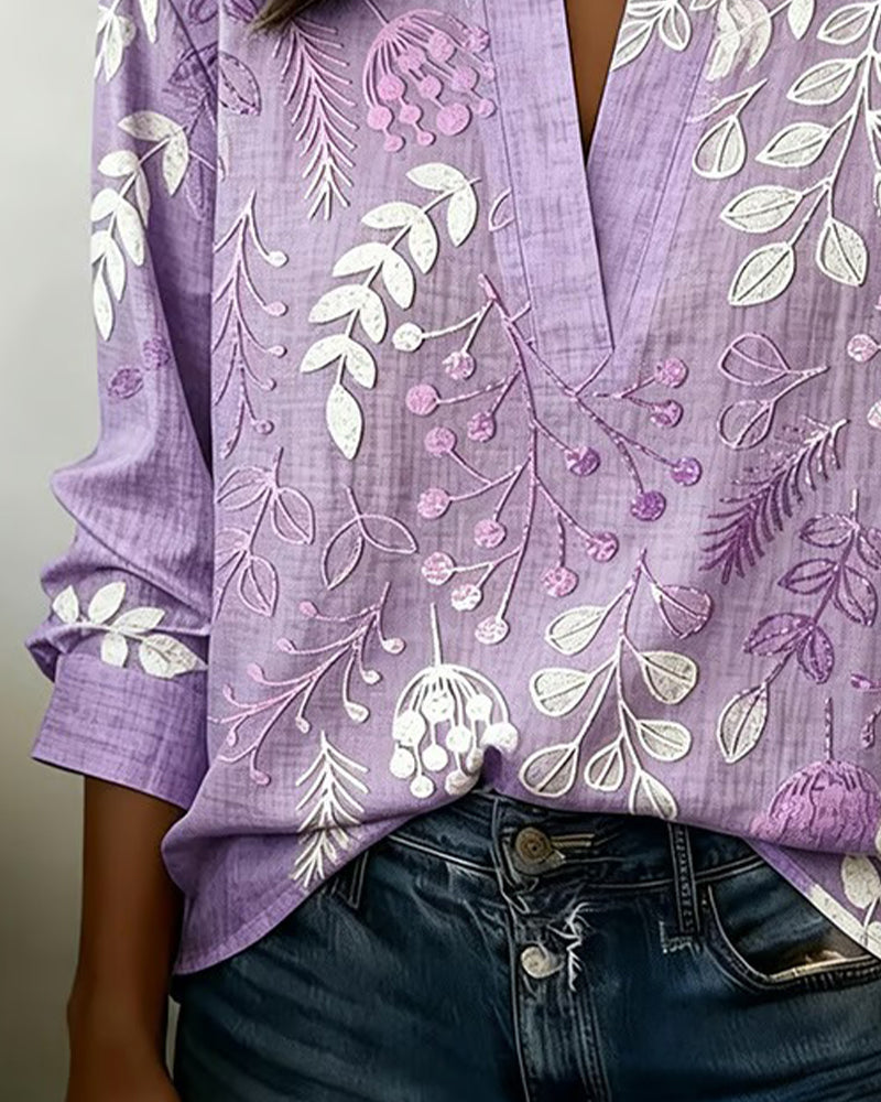 Women's botanical print blouse with notched collar and 3/4 sleeves