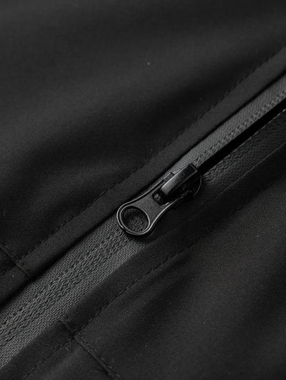 Men's black and green hooded jacket with yellow zips