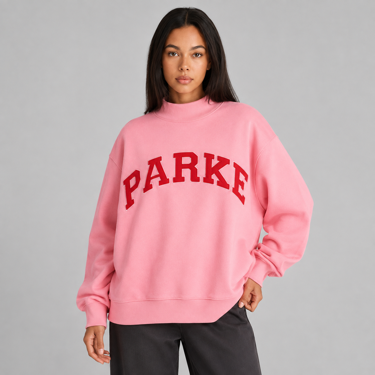 Women's oversized varsity sweatshirt with mock neck and front lettering