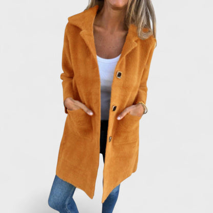 Women's longline textured coat with notched lapels, buttons and front pockets