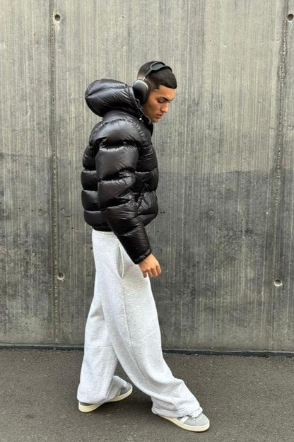 Men's hooded quilted puffer jacket with zip front and angled pockets