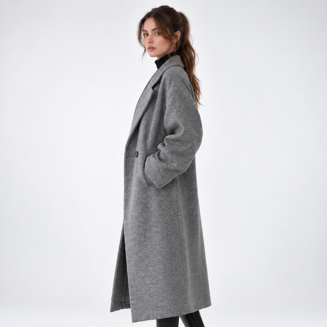 Women's long geometric patterned coat with notched lapels and button fastening