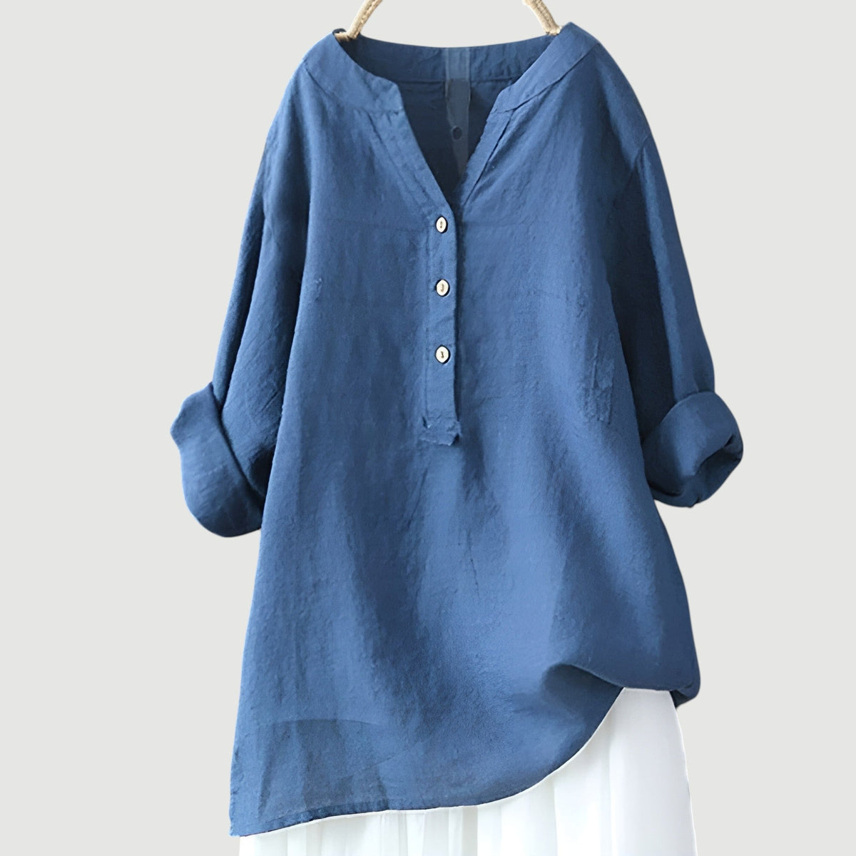Women's relaxed tunic blouse with V-neck button front and three-quarter rolled sleeves in rust and sage