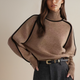 Women's turtleneck knit sweater with long sleeves and contrast piping