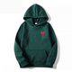 Women's hooded sweatshirt with small heart chest motif and kangaroo pocket