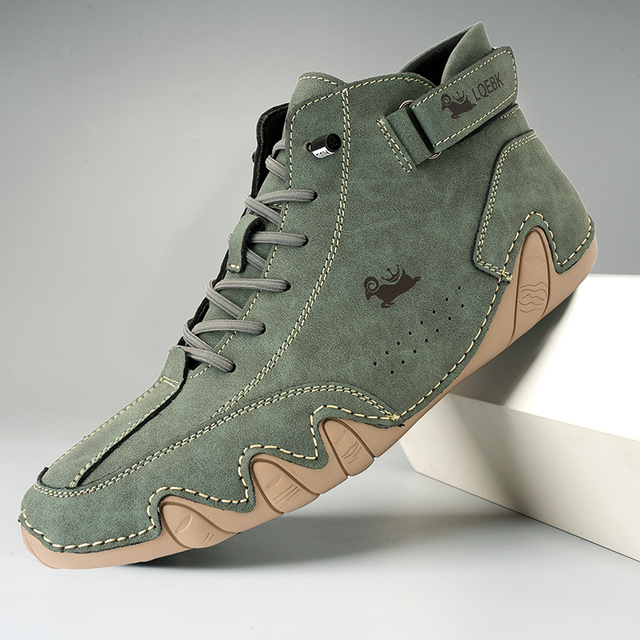 High-top lace-up ankle boots with ankle strap and textured flat sole