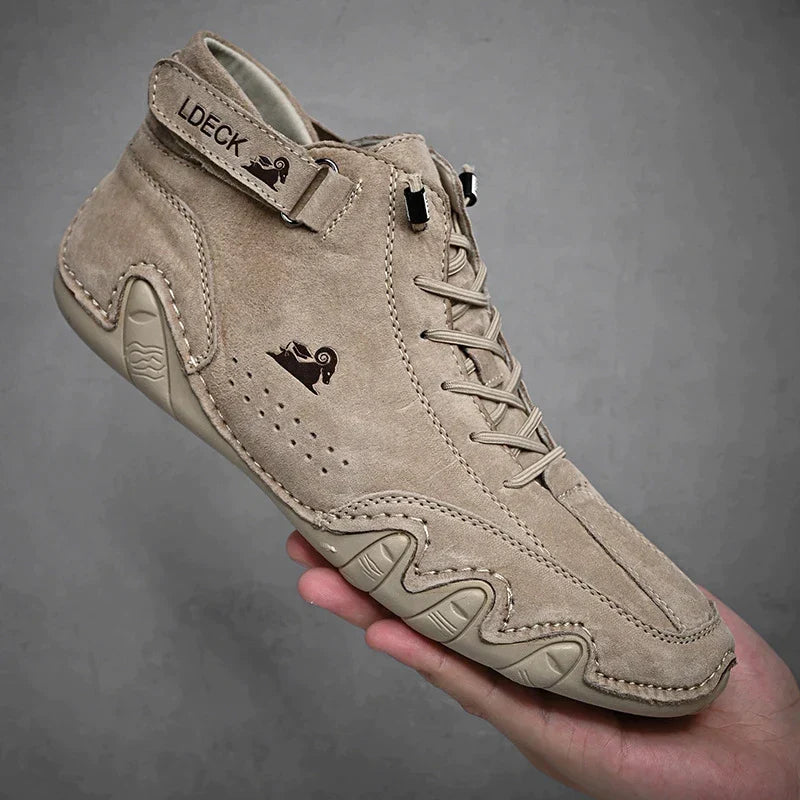 High-top lace-up ankle boots with ankle strap and textured flat sole