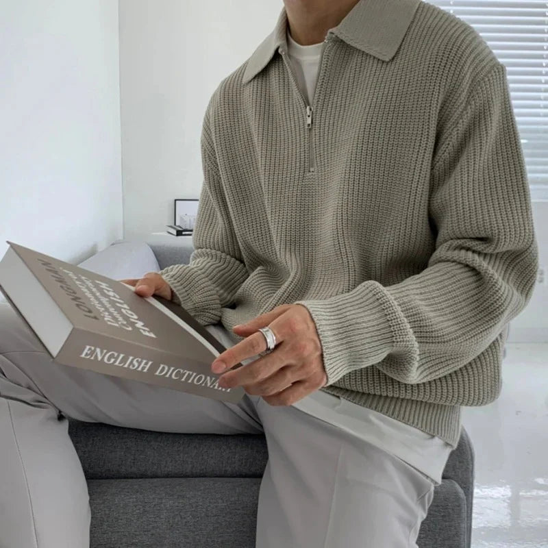 Men's quarter zip rib knit sweater with collared neckline and long sleeves