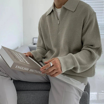 Men's quarter zip rib knit sweater with collared neckline and long sleeves