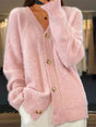 Women's textured cable knit cardigan with V-neck, buttons and front pockets