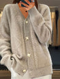 Women's textured cable knit cardigan with V-neck, buttons and front pockets