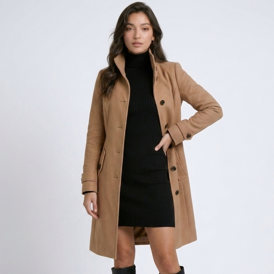 Women's long button-front coat with raised collar and tailored fit