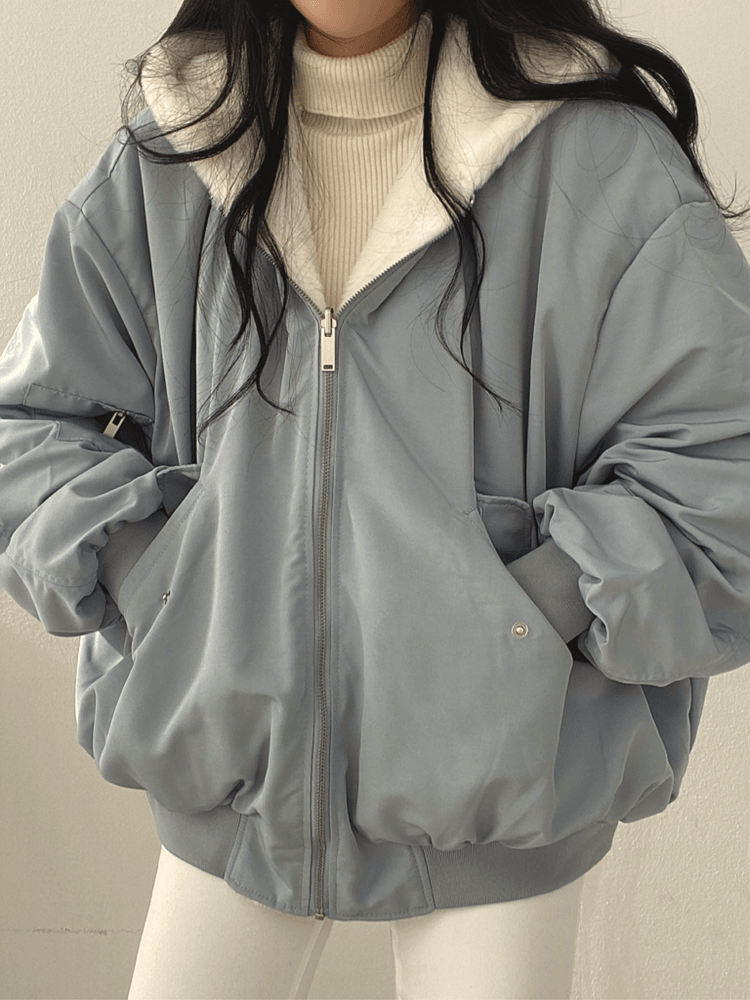 Women's reversible hooded bomber jacket with zip front and ribbed trims