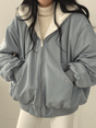 Women's reversible hooded bomber jacket with zip front and ribbed trims