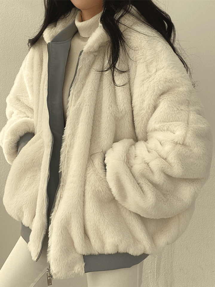 Women's reversible hooded bomber jacket with zip front and ribbed trims