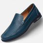 Men's perforated slip-on loafer with stitched trim and flat sole