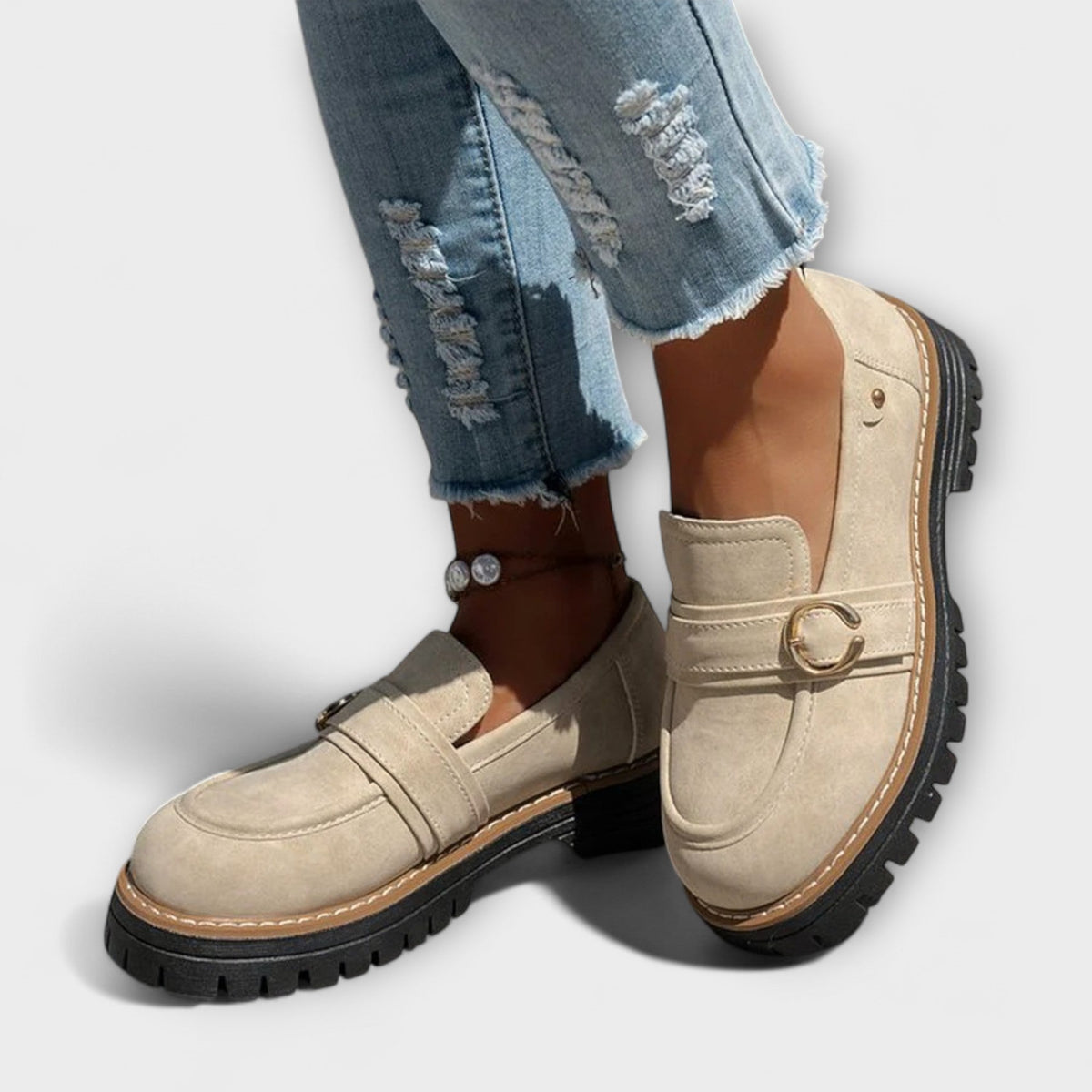 Women's round-toe loafers with metal ring trim and chunky lug soles