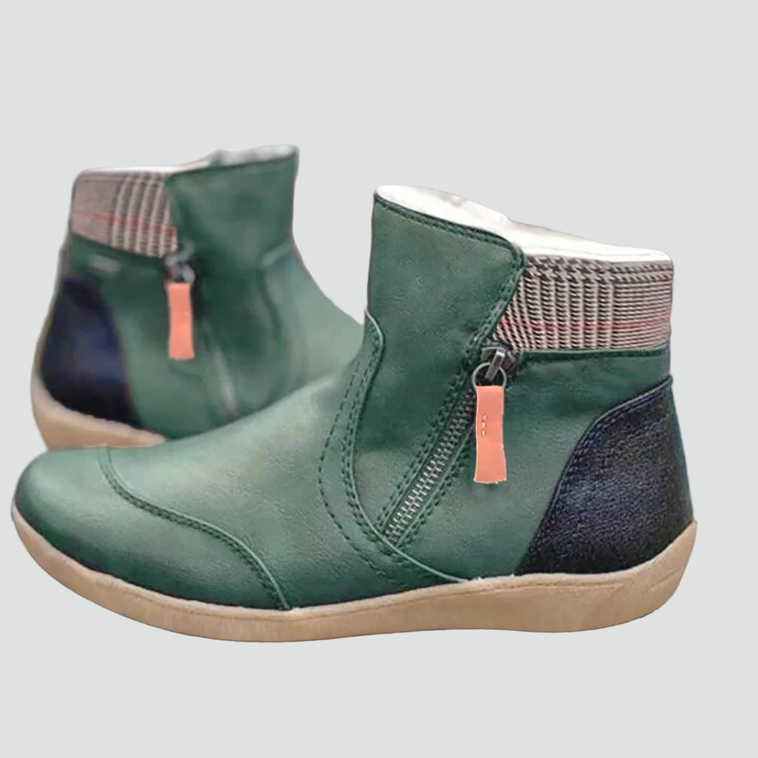 Women's zip ankle boots with round toe, checked collar and flat tan sole