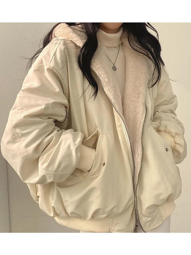 Women's reversible hooded bomber jacket with zip front and ribbed trims