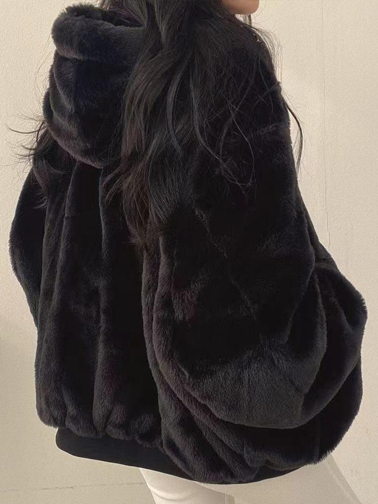 Women's reversible hooded bomber jacket with zip front and ribbed trims