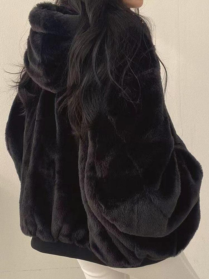 Women's reversible hooded bomber jacket with zip front and ribbed trims