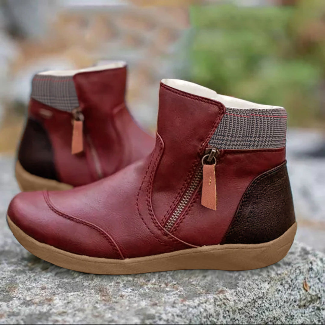 Women's zip ankle boots with round toe, checked collar and flat tan sole