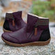 Women's zip ankle boots with round toe, checked collar and flat tan sole