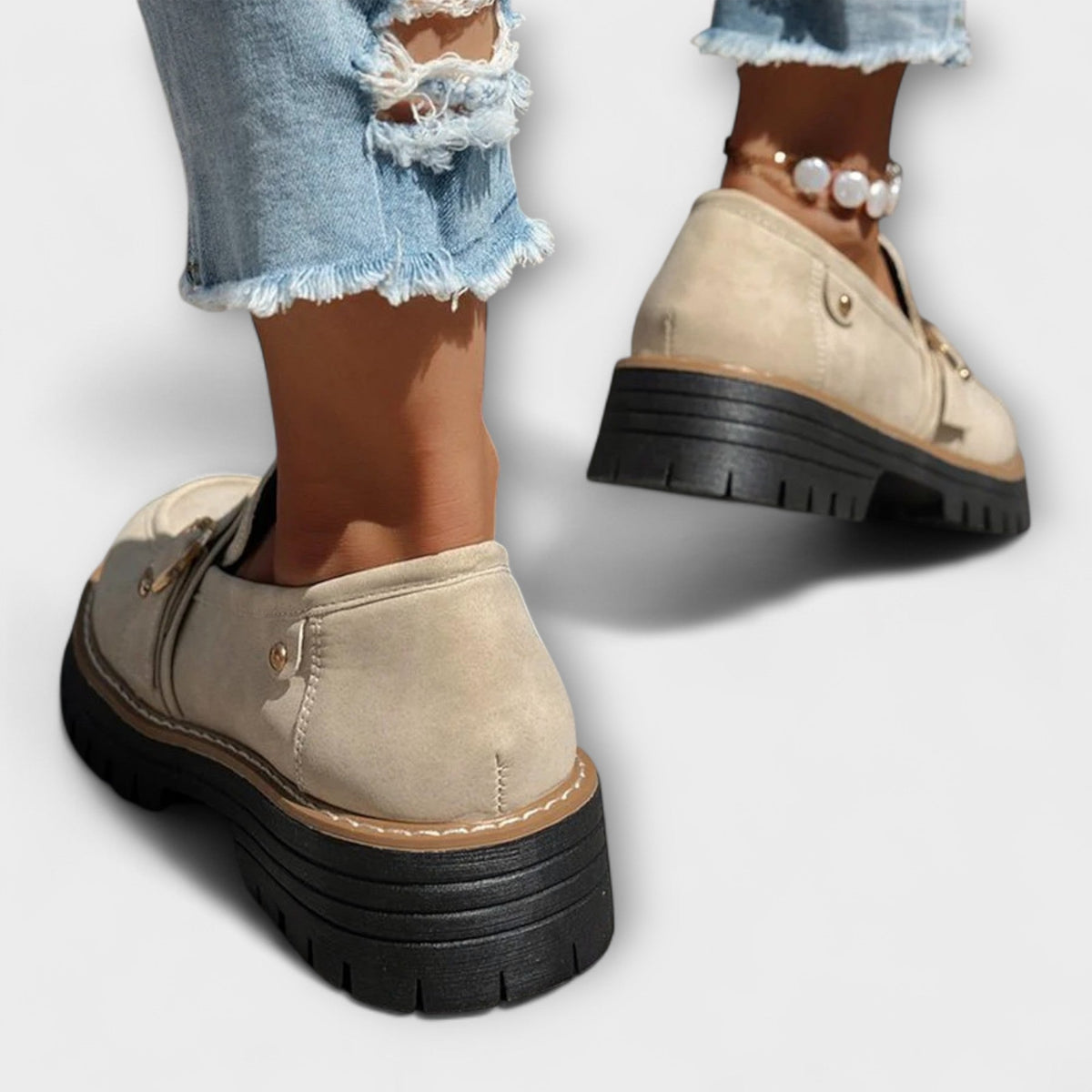 Women's round-toe loafers with metal ring trim and chunky lug soles