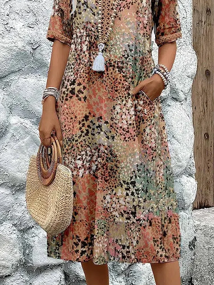 Women's abstract print midi dress with V-neck and three-quarter sleeves, shown in mixed-tone colourway