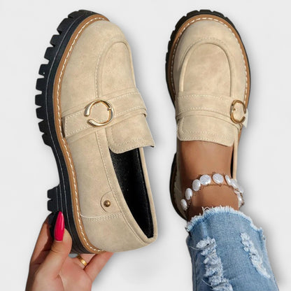 Women's round-toe loafers with metal ring trim and chunky lug soles