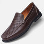 Men's perforated slip-on loafer with stitched trim and flat sole