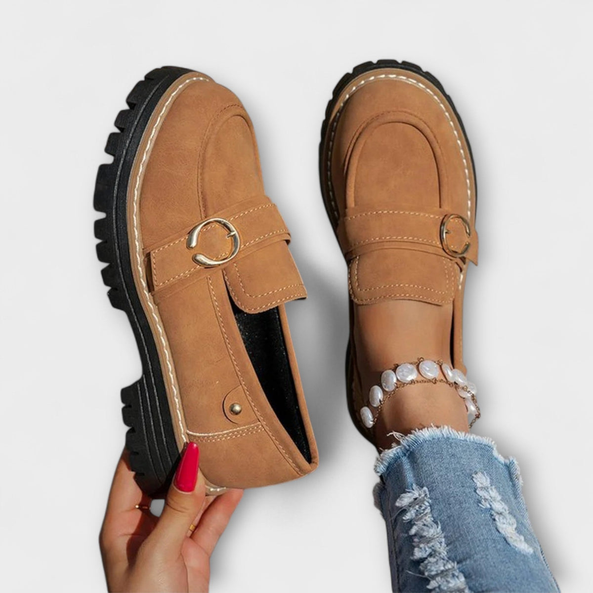 Women's round-toe loafers with metal ring trim and chunky lug soles