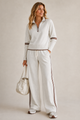 Women's zip sweater and wide-leg trouser set with contrast side stripes