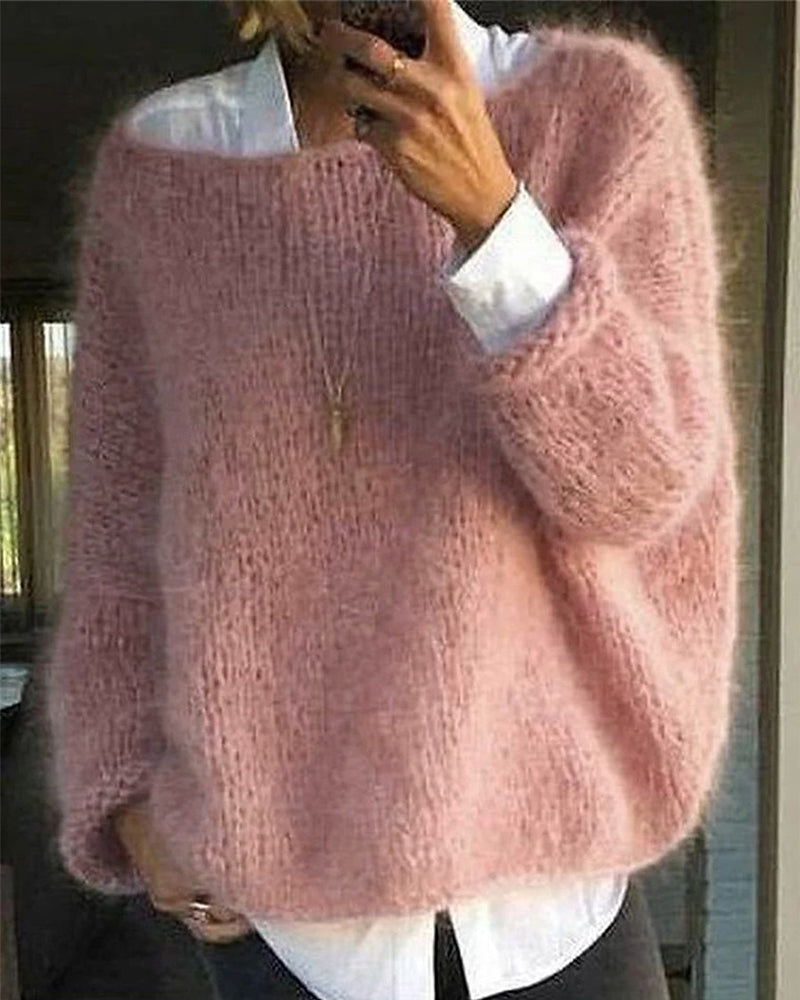 Women's relaxed textured knit sweater with crew neckline and long sleeves