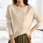Women's plain knit button-front cardigan with round neck