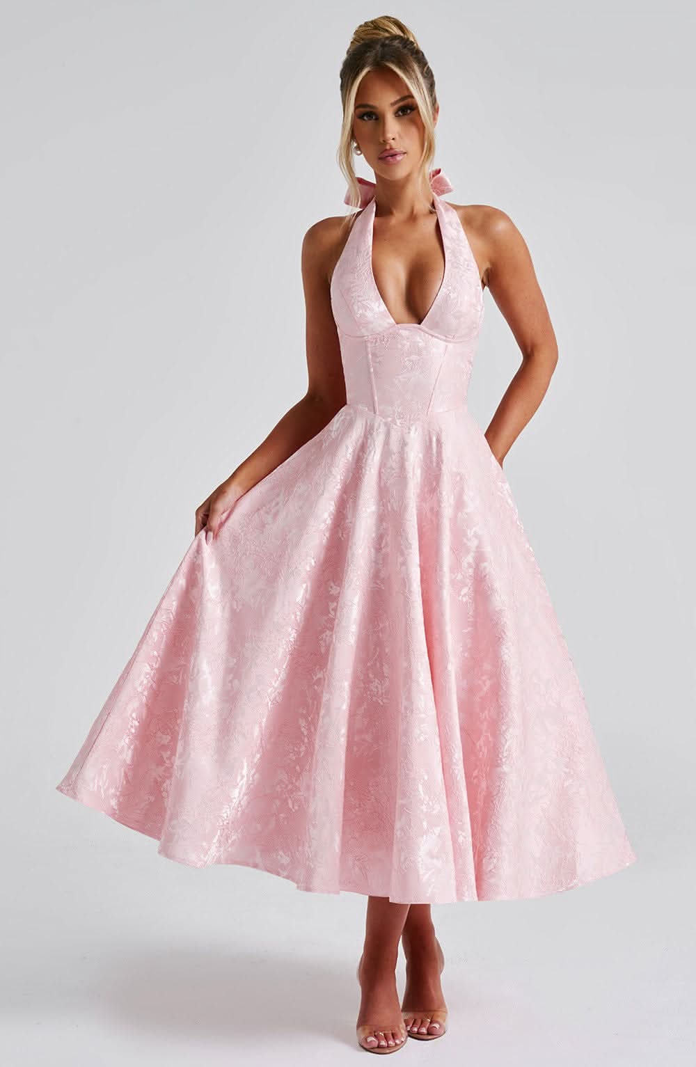 Women's halter midi dress with V-neckline and full A-line skirt in white and pale yellow