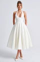 Women's halter midi dress with V-neckline and full A-line skirt in white and pale yellow