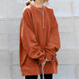 Women's oversized crew neck sweatshirt with long sleeves and curved hem