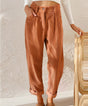 Women's high-waisted corduroy trousers with straight legs, side pockets and rolled ankle cuffs