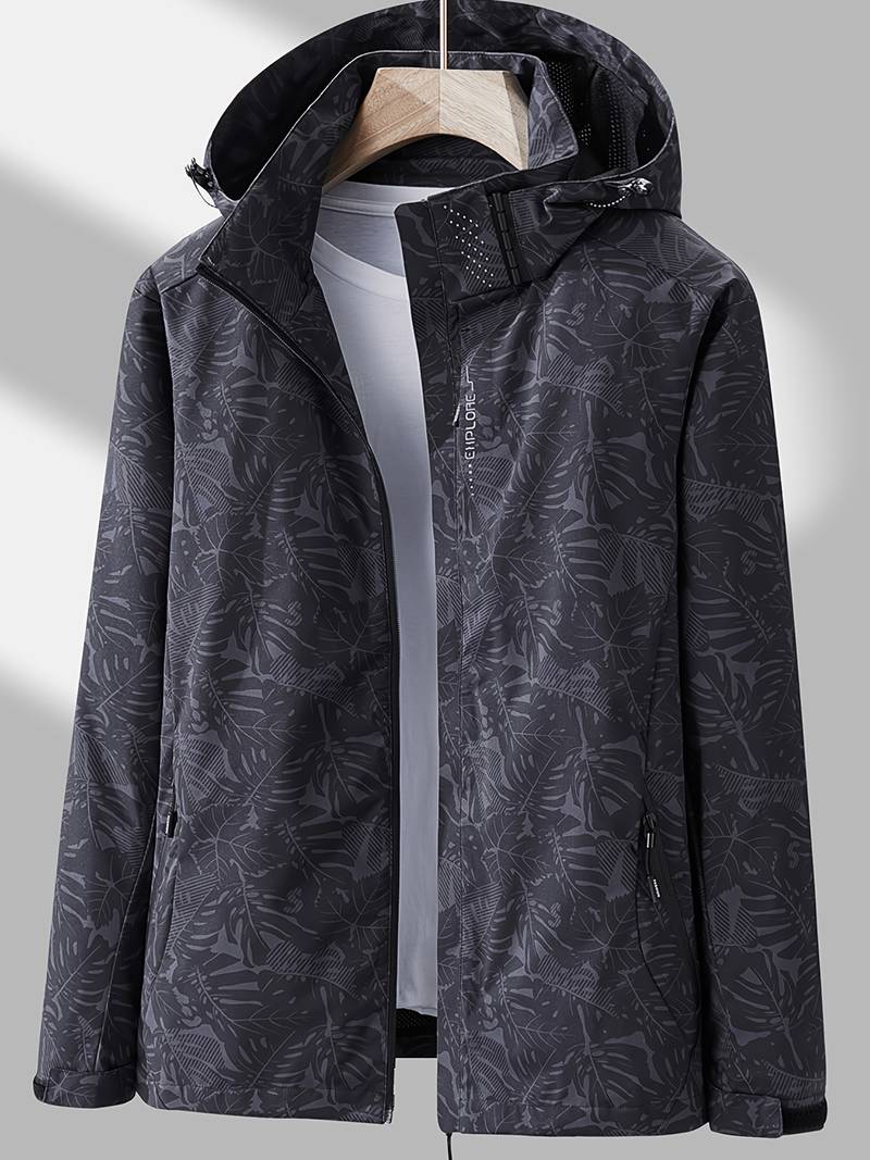 Women's hooded leaf print rain jacket with long sleeves and zipped pockets