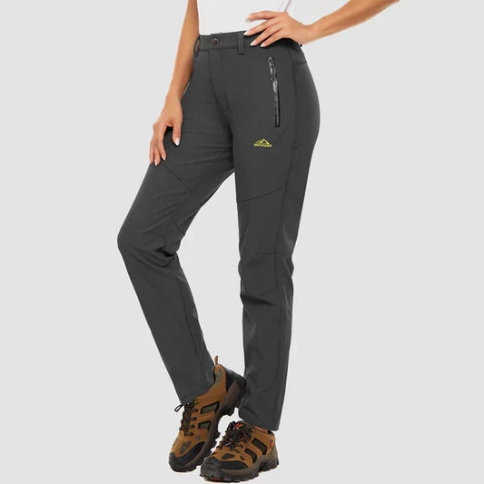 Women's straight-leg snow pants with zip pocket and paneled seams